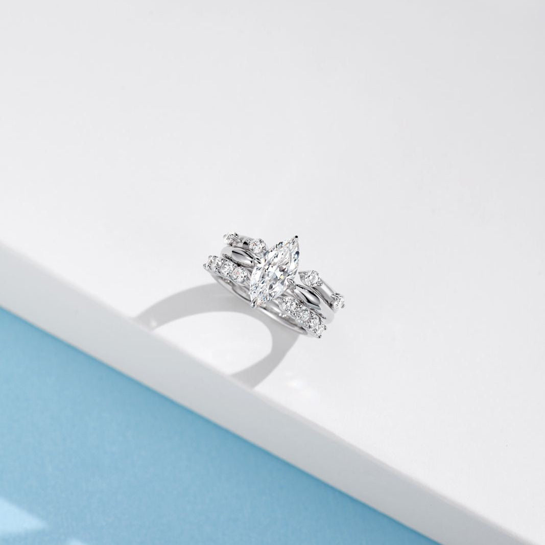 Diamond ring on a light blue and white background