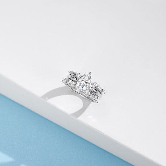 Diamond ring on a light blue and white background